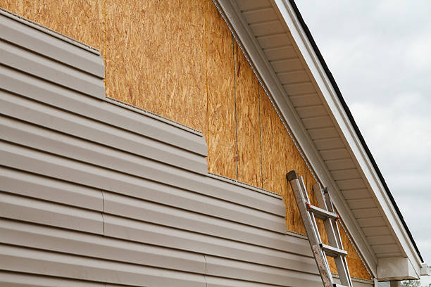 Professional Siding Contractor technician working in Youngsville, NC